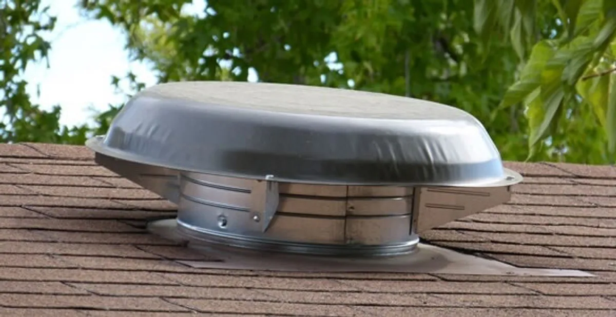 attic fan installation services with low-profile roof ventilation unit in Richmond, VA