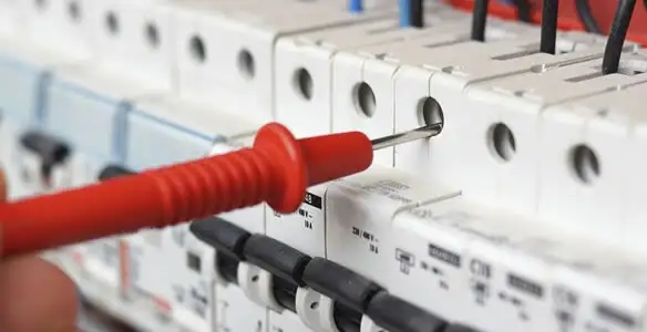 Electrical contractor testing circuit breakers during electrical repair in Midlothian, VA