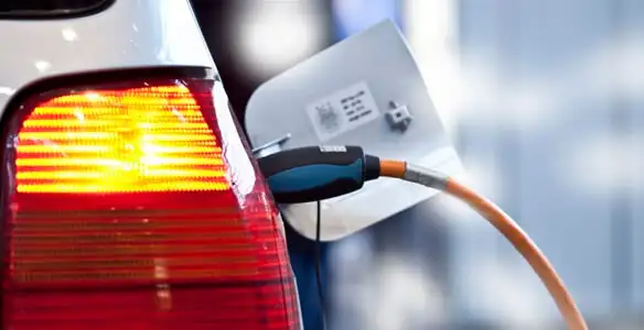 Electric car plugged into EV charger after professional installation in Richmond, VA