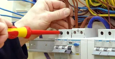 electrician services performing professional electrical panel wiring and connections in Richmond, VA