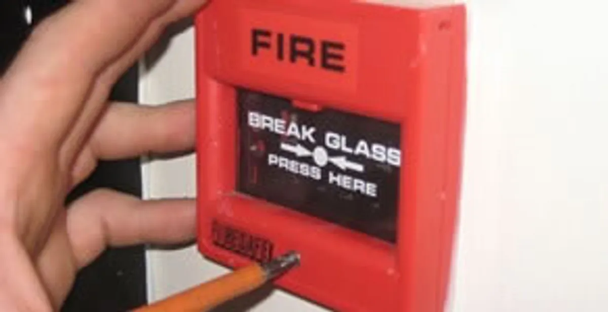 fire alarm installation service showing manual fire alarm pull station installed by licensed electricians in Richmond, VA