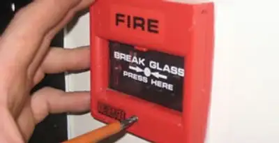 fire alarm installation service showing manual fire alarm pull station installed by licensed electricians in Richmond, VA