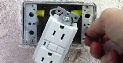 gfci circuits service showing installation of a ground fault circuit interrupter outlet by licensed electricians in Richmond, VA
