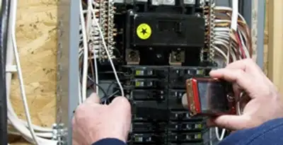 Home electrical inspection of circuit breaker panel by licensed electrician in Richmond, VA