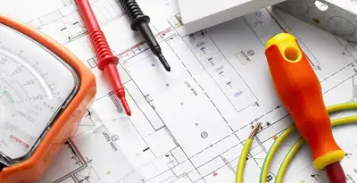 licensed electrician planning and testing electrical systems using professional tools in Richmond, VA