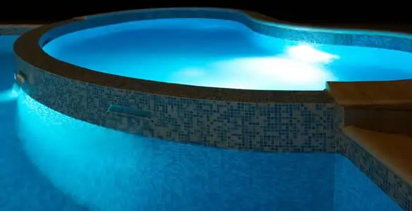 pool light installation and repair services highlighting illuminated pool interior lighting in Richmond, VA