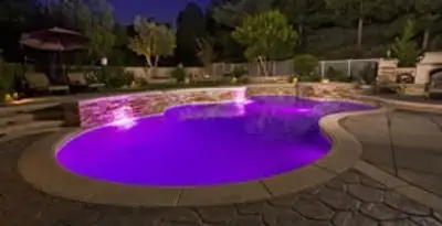 pool light installation and repair services illuminating a residential swimming pool in Richmond, VA