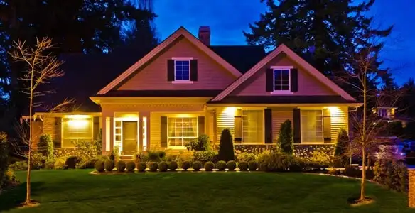 security light installation services illuminating a residential exterior at night in Richmond, VA