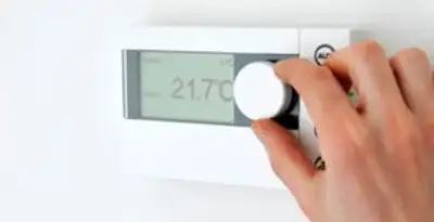 Thermostat installation service with professional adjusting temperature control in Richmond, VA