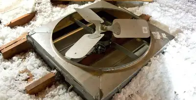 whole house fan installation services with attic-mounted ventilation unit in Richmond, VA